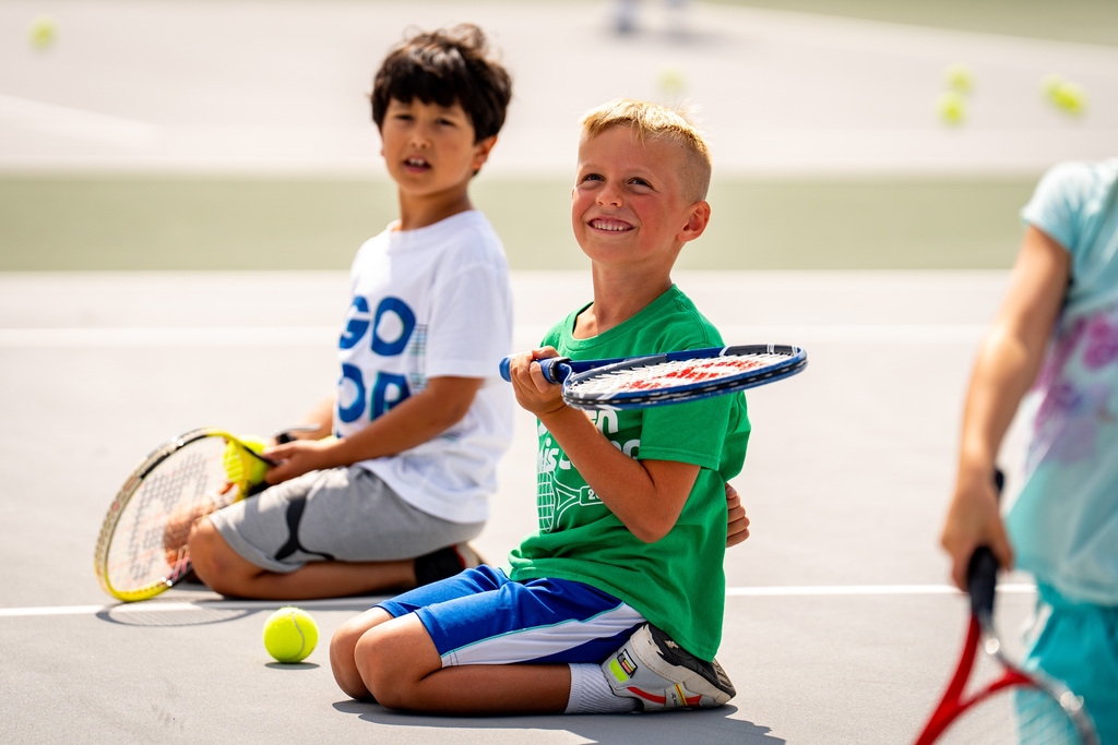 Jenison Tennis camp boy smiling