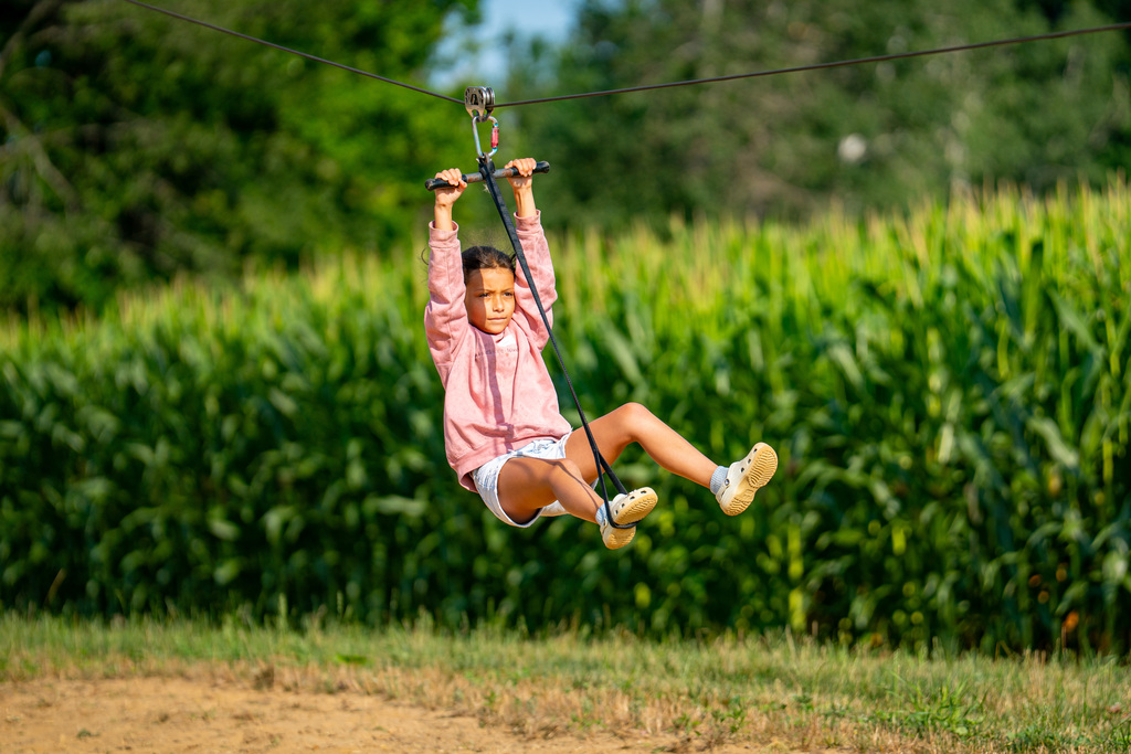 JIA student on zipline