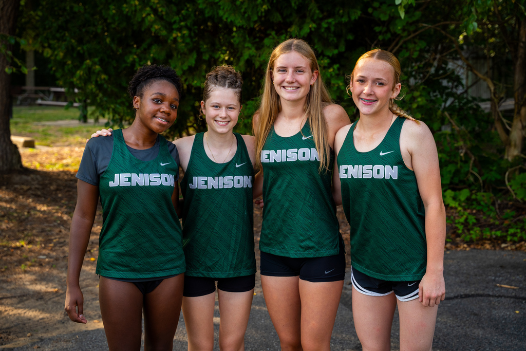 Girls cross country posing