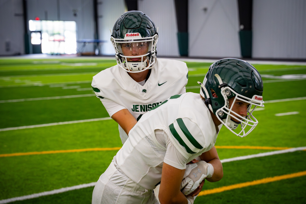 Quarterback handing off