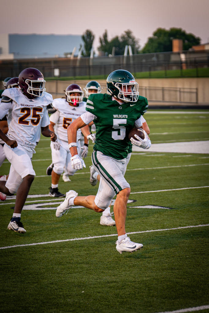 Running back running down field