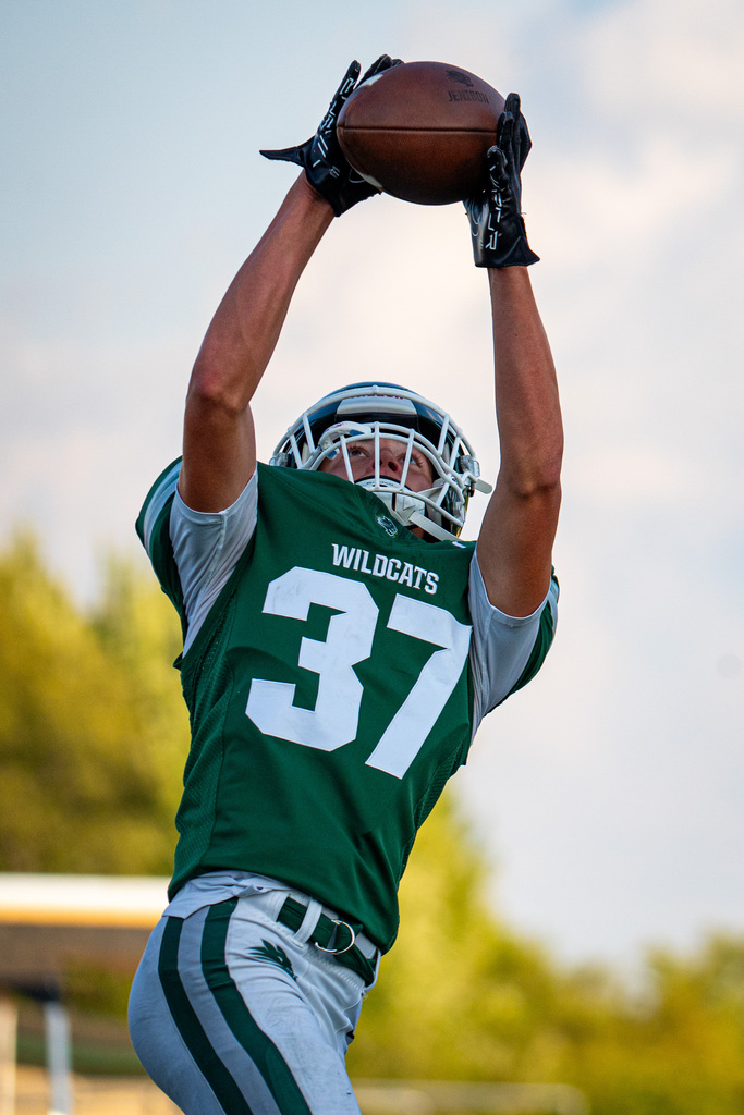 Player jumping to catch ball
