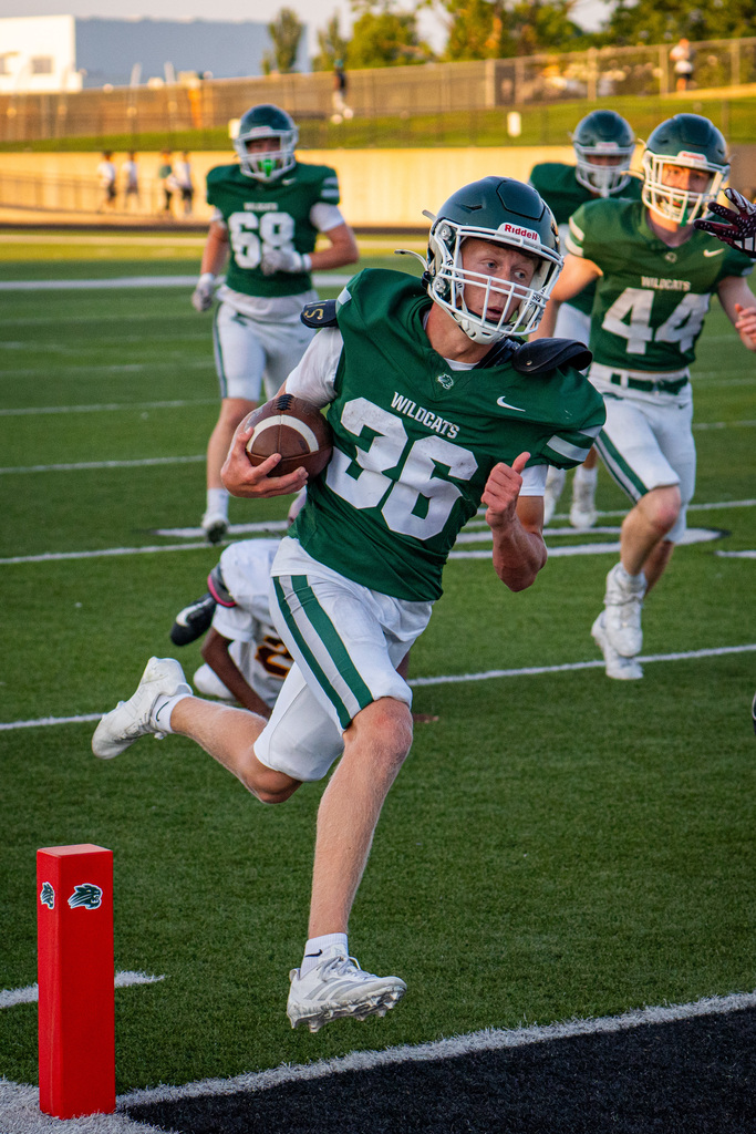 Running back running down field