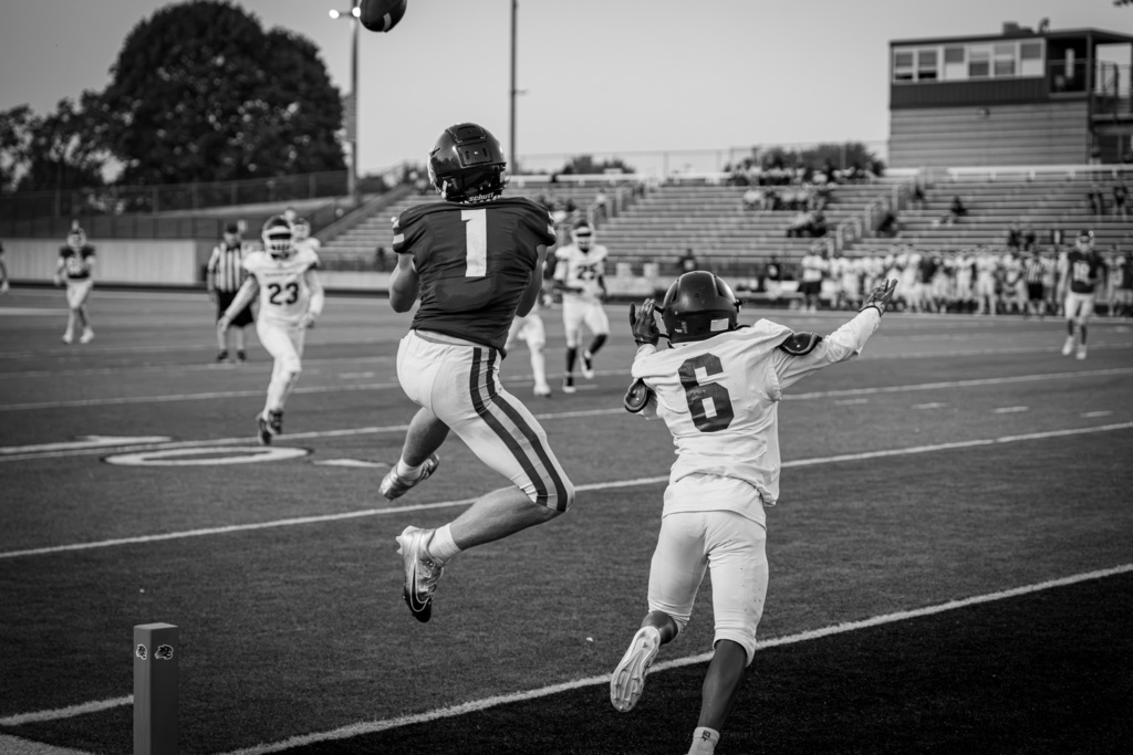 Wide receiver jumping for ball