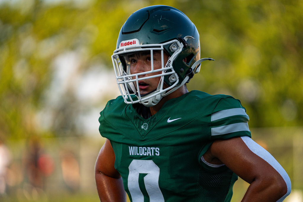 Player with hands on hips