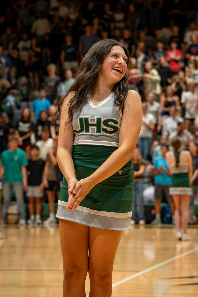 Cheerleader smiling at rally