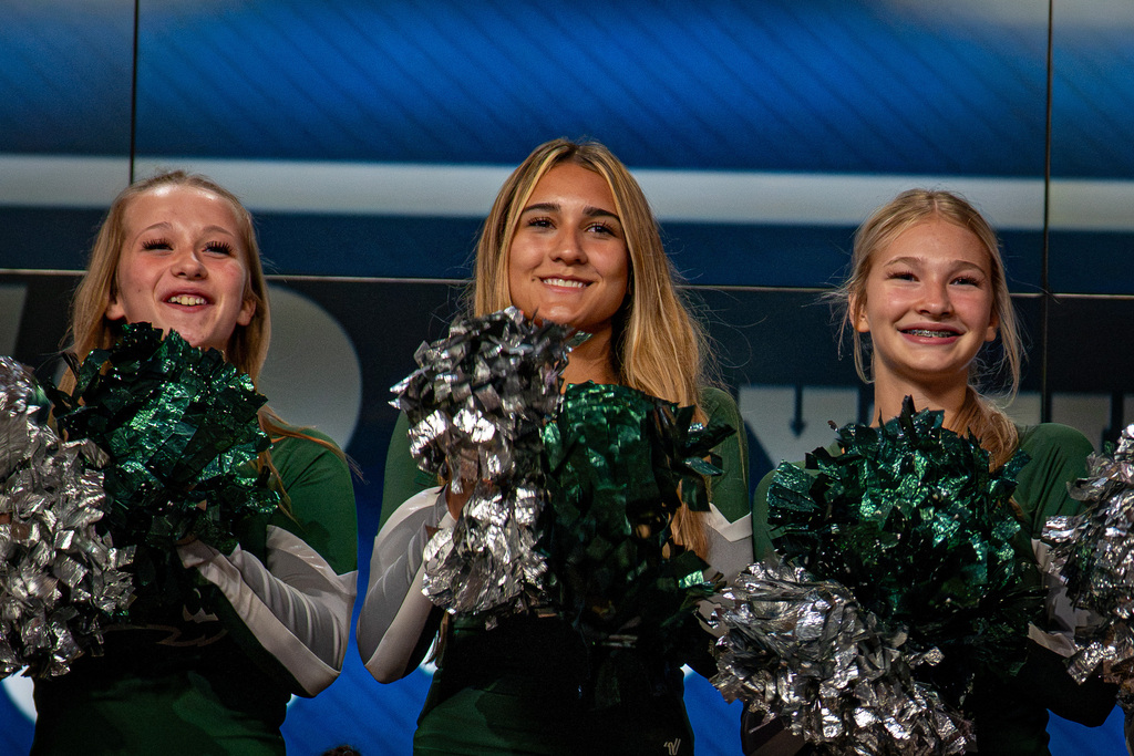 Cheerleaders cheering at TV studio