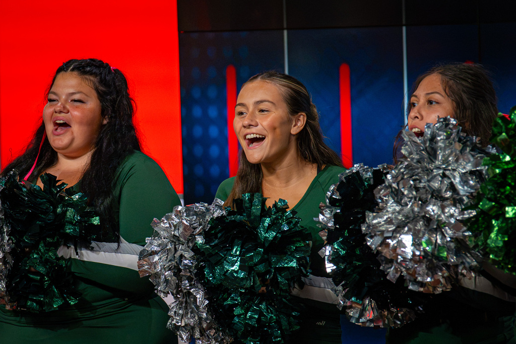 Cheerleaders cheering at TV studio