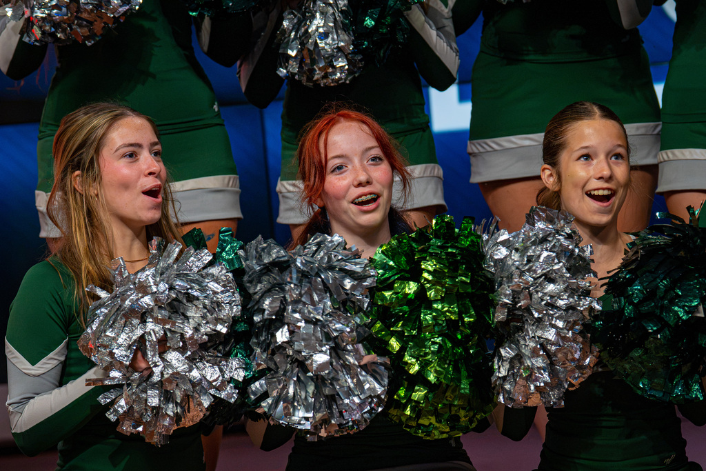 Cheerleaders cheering at TV studio