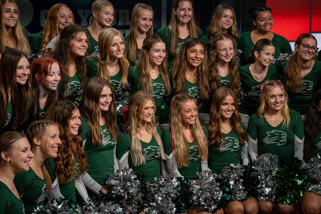 Cheerleaders cheering at TV studio