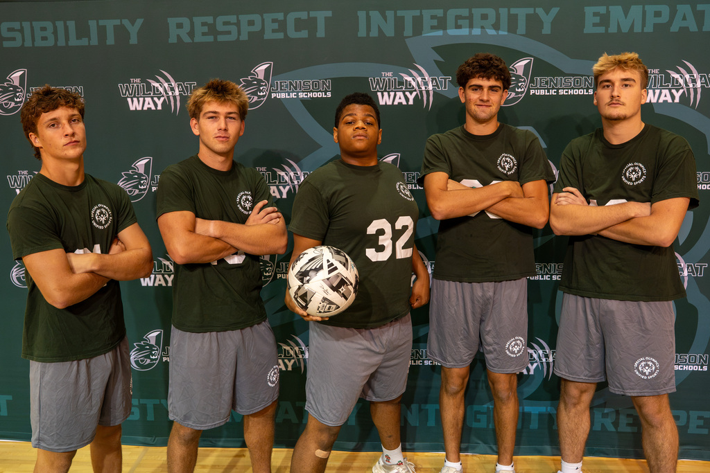 Unified athletes posing with soccer ball
