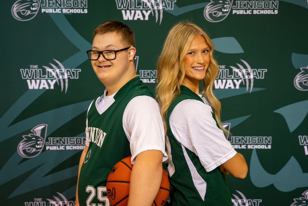 Unified athletes posing with basketball