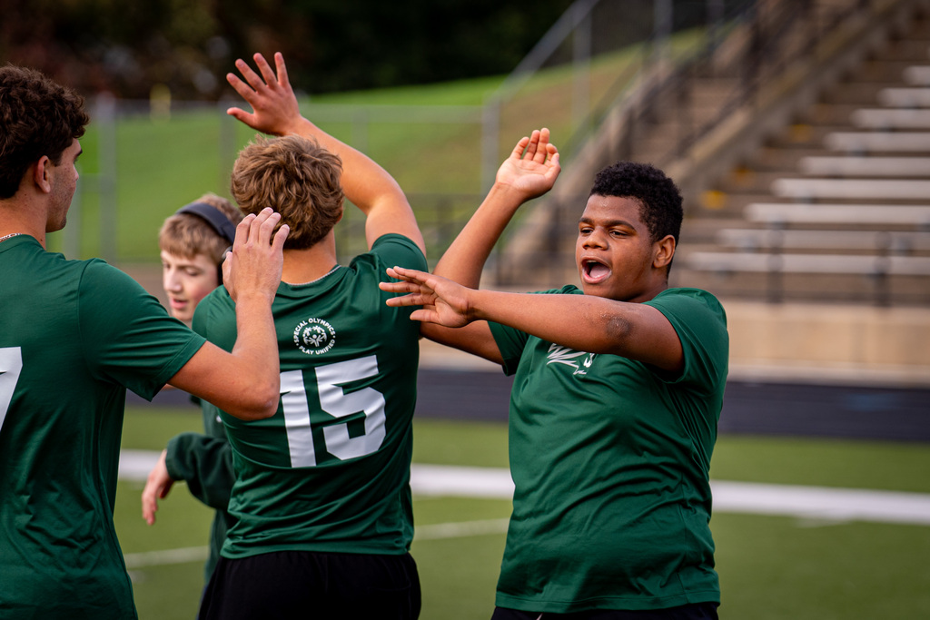 Students celebrating a goal