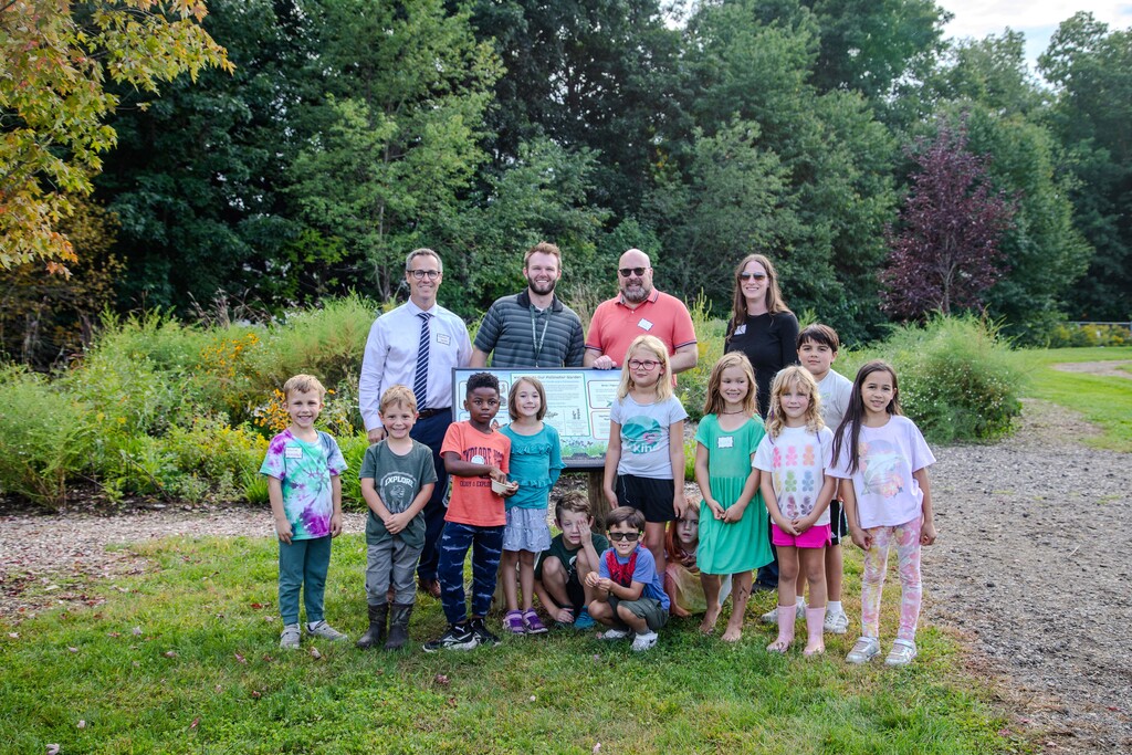 Wilderness Academy students and staff celebrating new garden