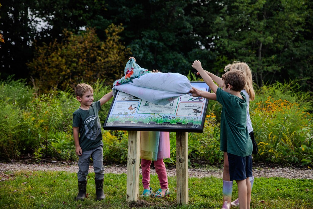 Wilderness Academy students unveiling new sign