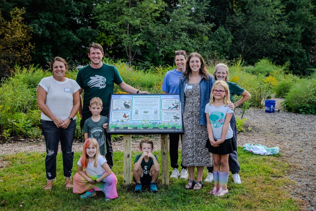 Wilderness Academy students and staff celebrating new garden