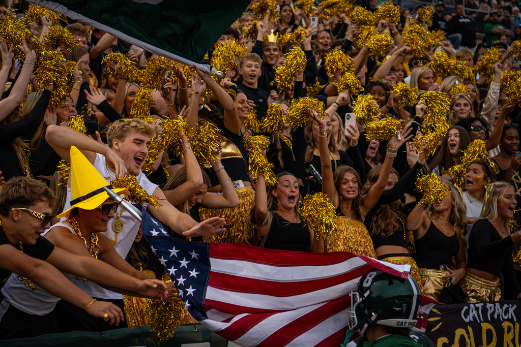 Student section cheering on players