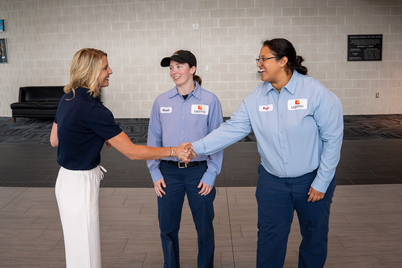 JPEF shaking hands with employees