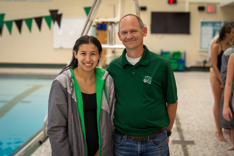 Swimmer and teacher posing