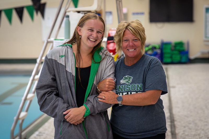 Swimmer and teacher posing