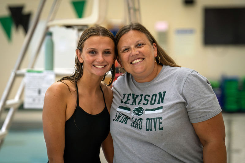 Swimmer and teacher posing