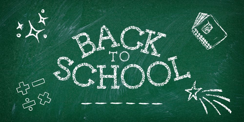 back to school written on a chalk board