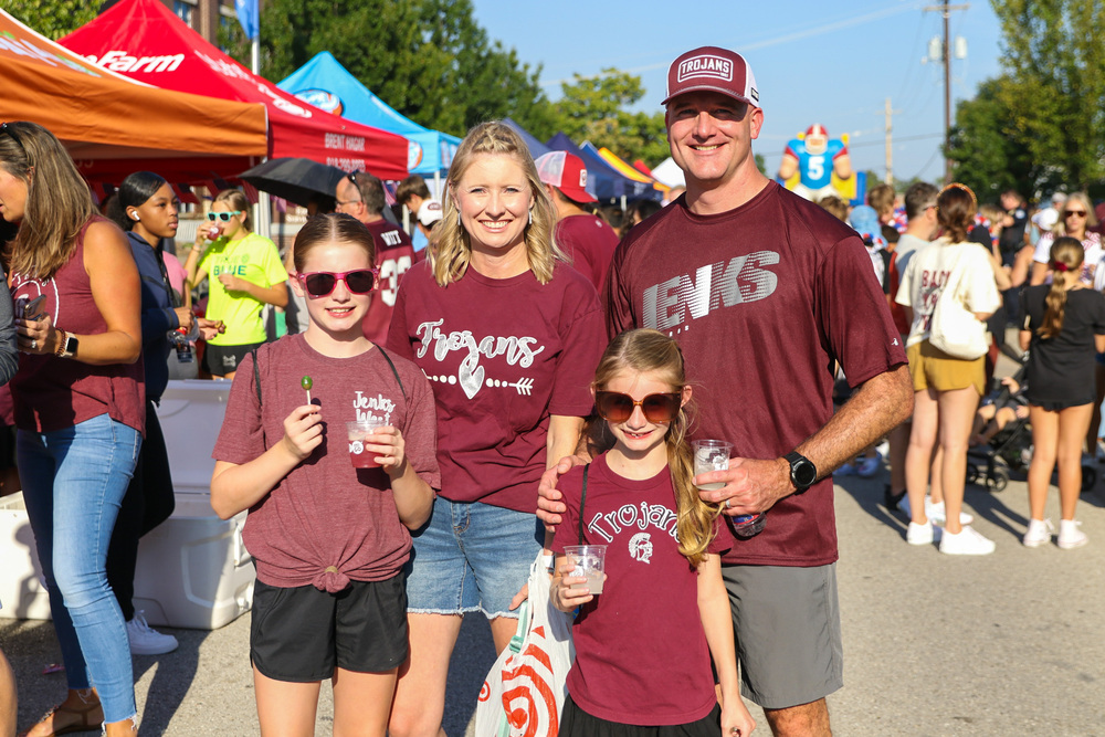 family at hometown huddle