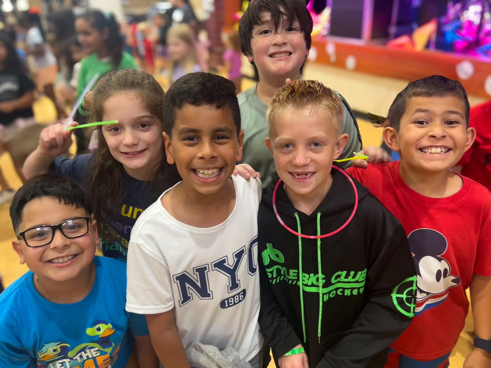 kids smiling at fundraiser