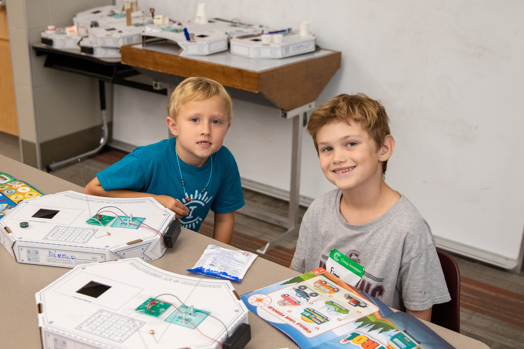 two boys smiling for a photo