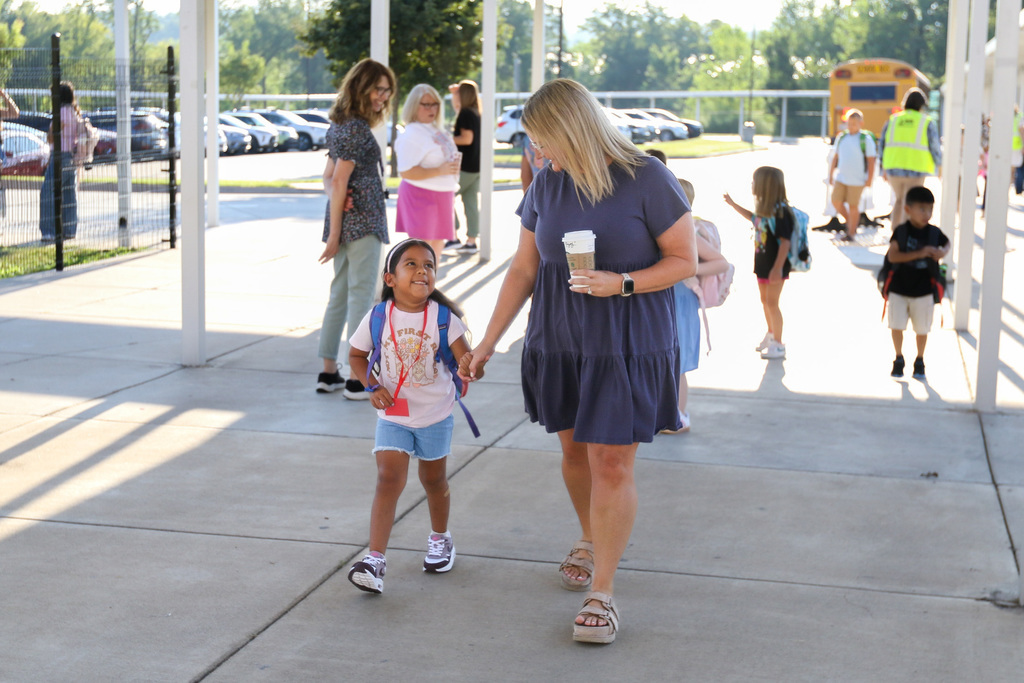 teacher walking in a student