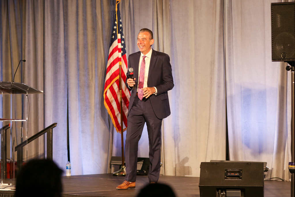 speaker todd whitaker smiling