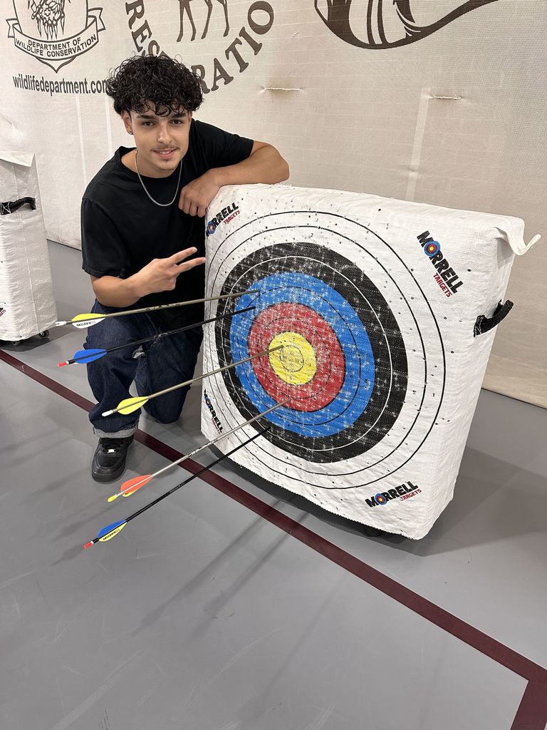 A student with his archery target