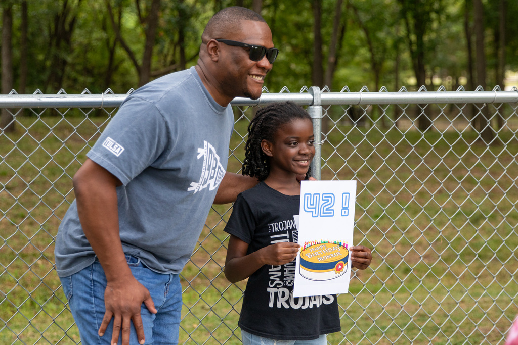 Mayor Nichols posing for picture with student