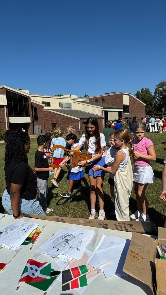 students at Global Village doing activities