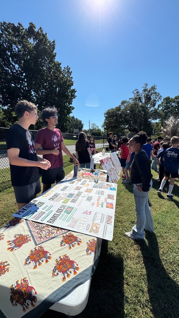 student learning from high schoolers