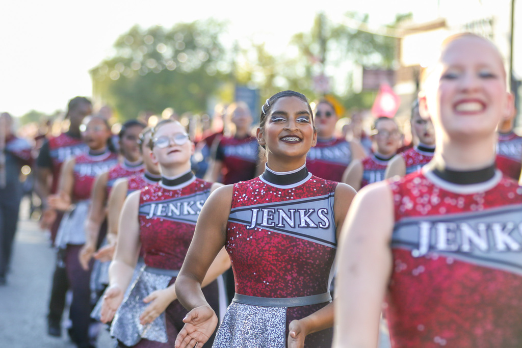 jenks color guard marching in the parade