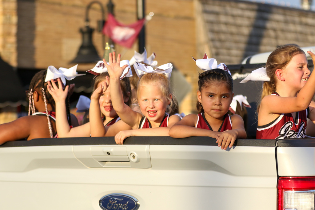 little cheerleader waving