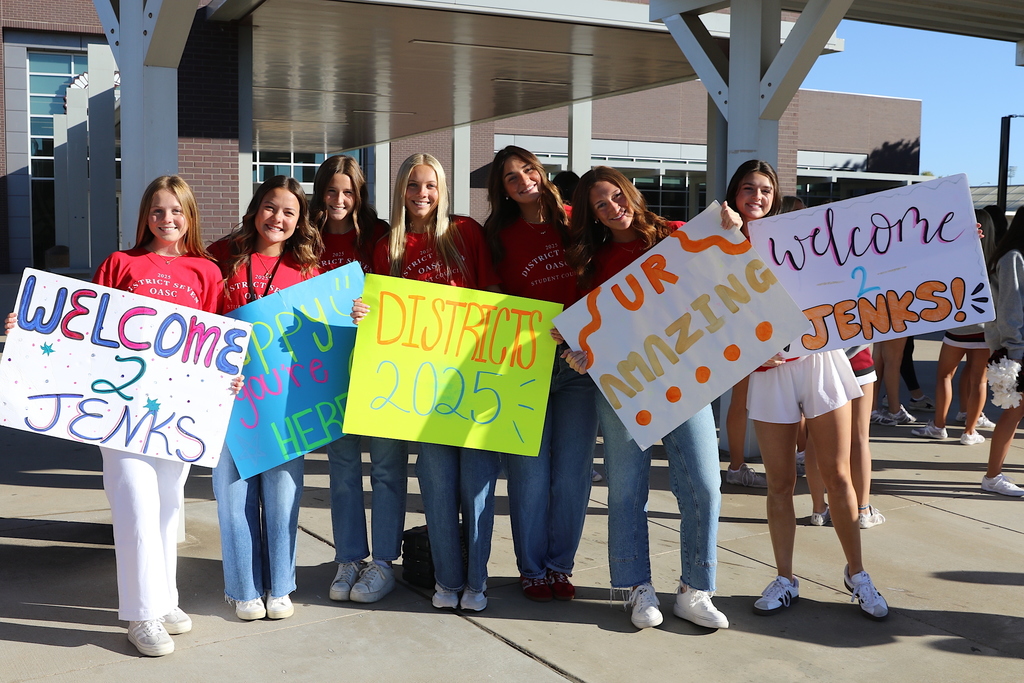 members of Jenks Student Council showing off their welcome signs