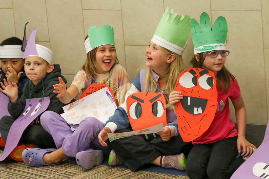 two girls dressed up as creepy carrots