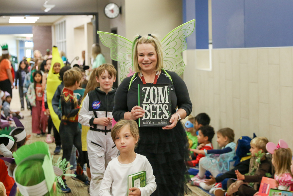 teacher dressed up as a zom-bee