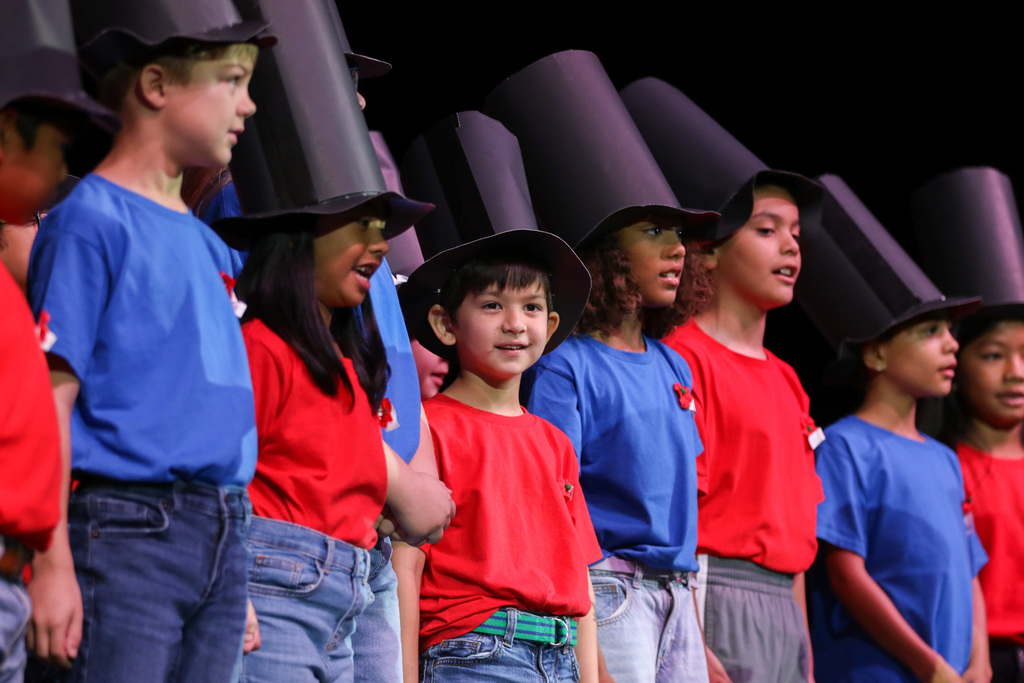 boy smiling in a top hat