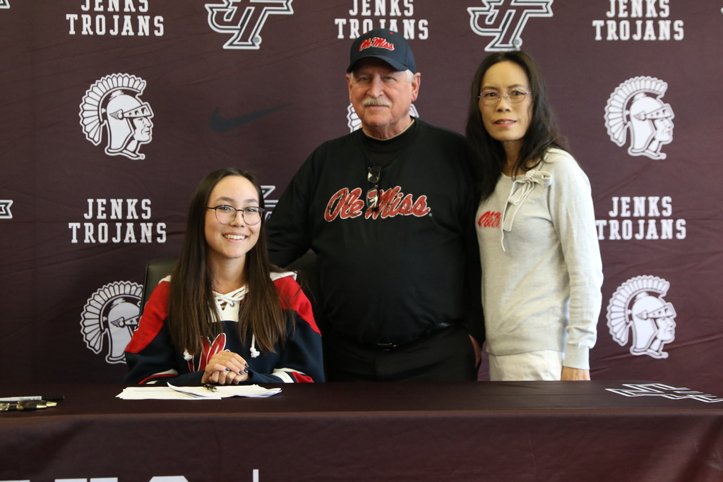 photo of Lisa Herman with her parents