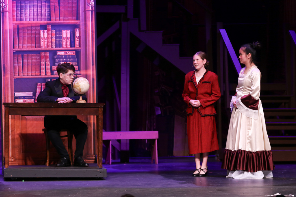 leads talking around a desk