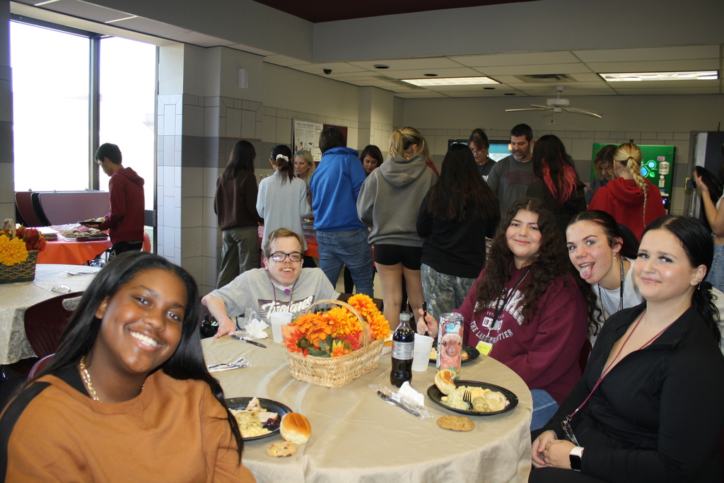 Students around a table 