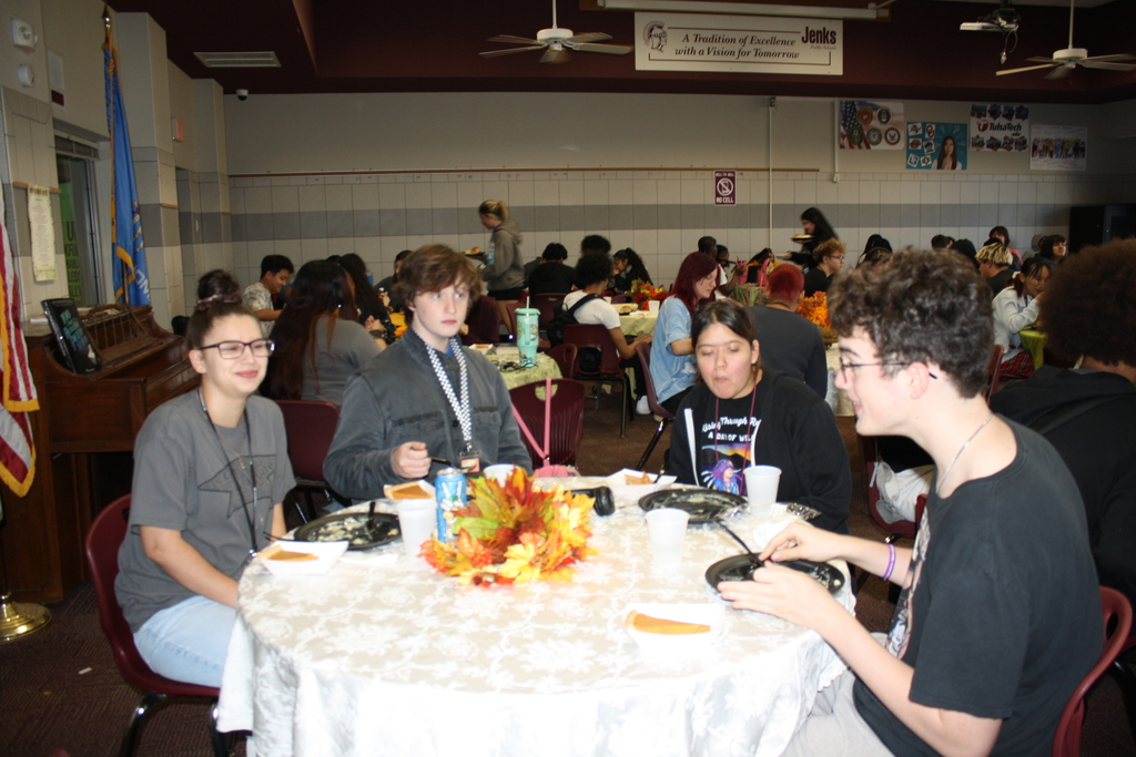 students at a table eating 