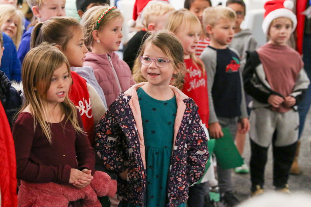 student smiling at other students