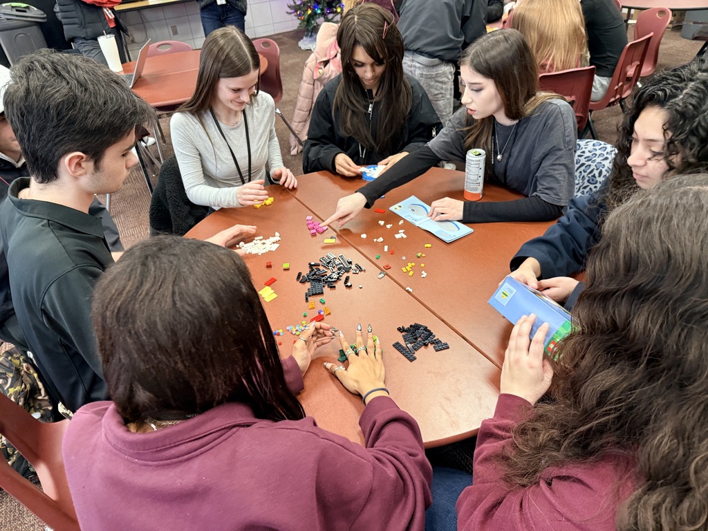 group of students organize legos