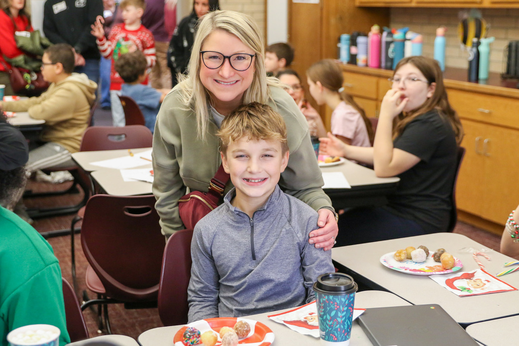 mom and son pose for a picture