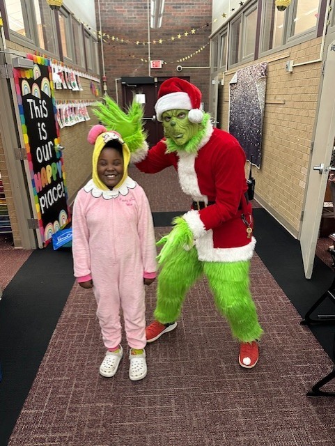 grinch with student