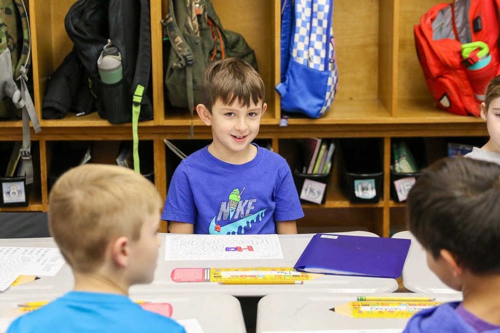 boy smiiling at the camera 